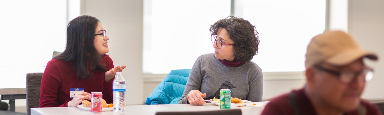 Professor Mayra Fortes and student